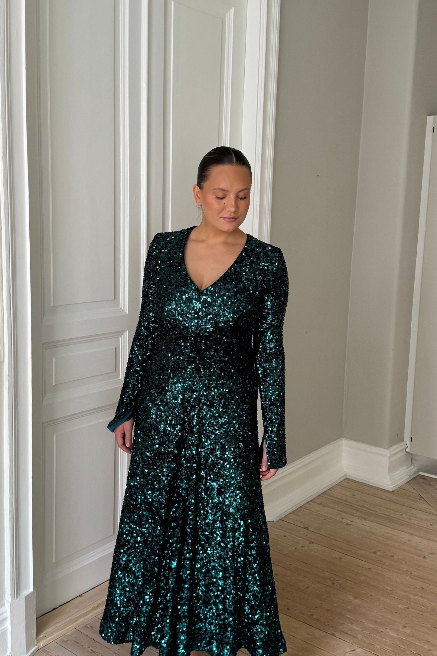 The Emerald Sequin Rotate Dress
